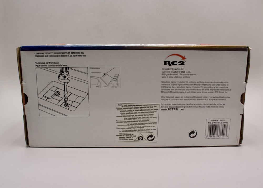 Zadní strana balení modelu Mitsubishi Lancer Evolution VII 2002 Top Tuners 1:18 Ertl 36700