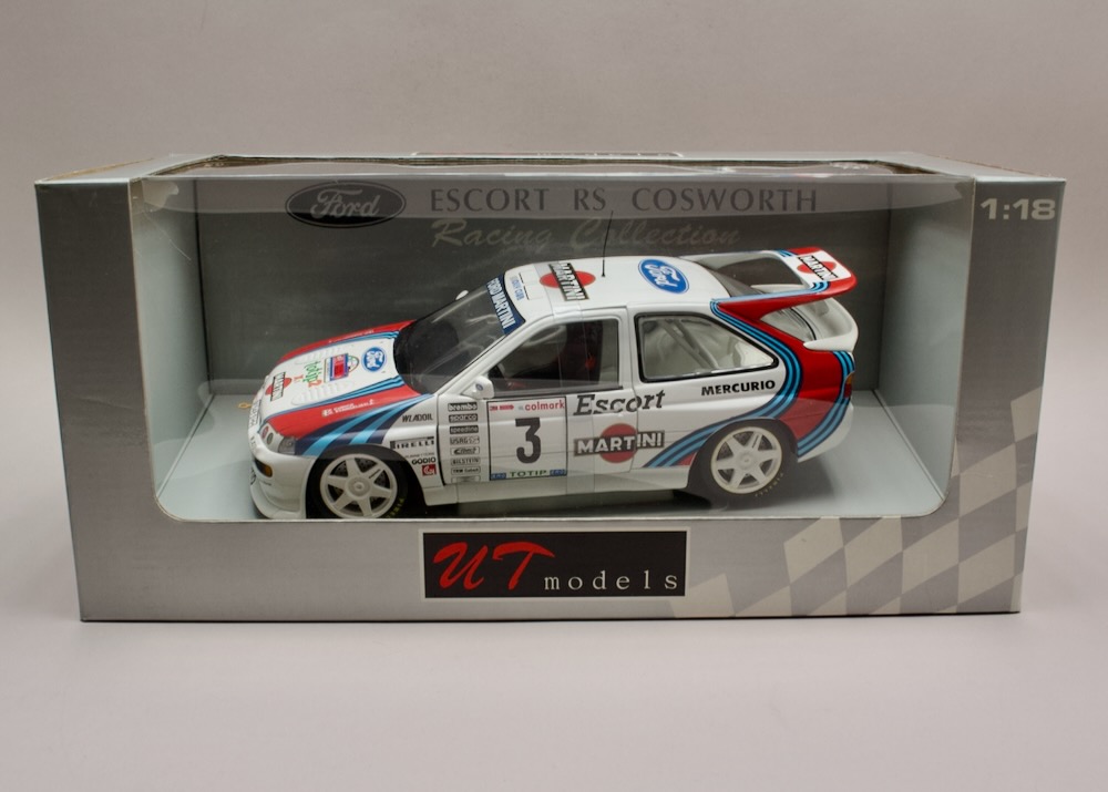 Ford Escort RS Cosworth Martini Racing 1000 Miglia 1995 1:18 UT Models 39550 – Cunico / Evangelisti, nevybalený, prasliny na levé části obalu.