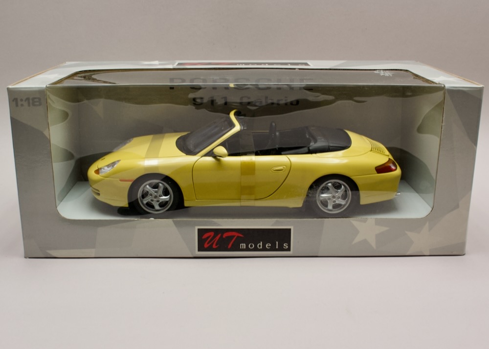 Porsche 911 (996) Carrera Cabriolet 1:18 UT Models 27906 – žlutá, nevybalený